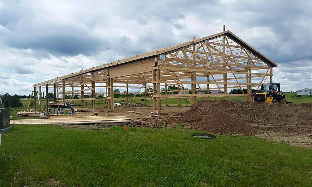 Post_Frame-04 post frame construction shell with roof trusses installed