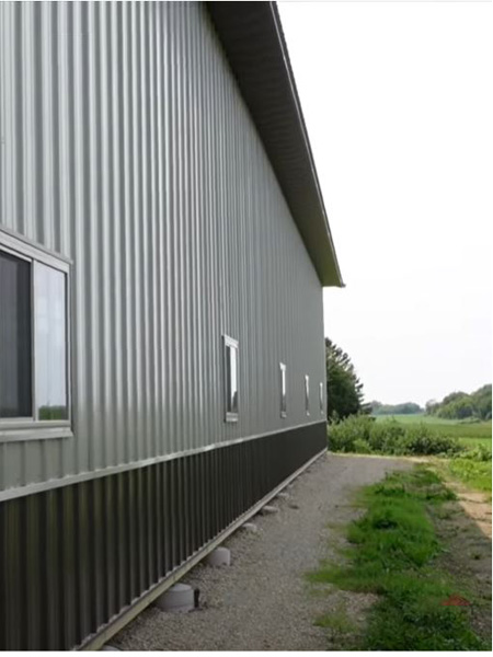 Post_Frame-16 Corrugated Steel siding on post frame construction barndominium